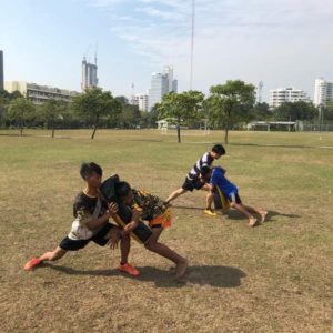 Nak Suu Rugby tackling