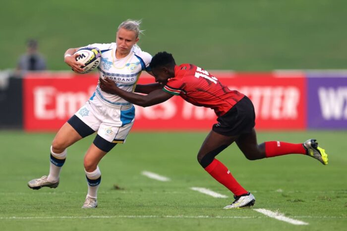 DUBAI, UNITED ARAB EMIRATES - OCTOBER 20: Darya Tkachyova of Kazakhstan is tackled by Freshia Odour of Keyna during the WXV 3 2023 match between Kenya and Kazakhstan at The Sevens Stadium on October 20, 2023 in Dubai, United Arab Emirates. (Photo by Christopher Pike - World Rugby/World Rugby via Getty Images)