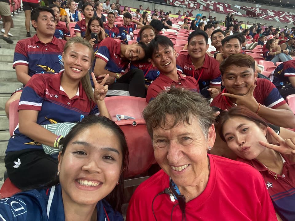 Viengsamai (‘Vieng’) Souksavanh (CEO of Lao Rugby Federation) with LRF sevens players and Joy Walter SRU